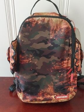 Sprayground Lil T Jay Fallin Angel 4 Wing Black Brown Orange Flame Camo Backpack